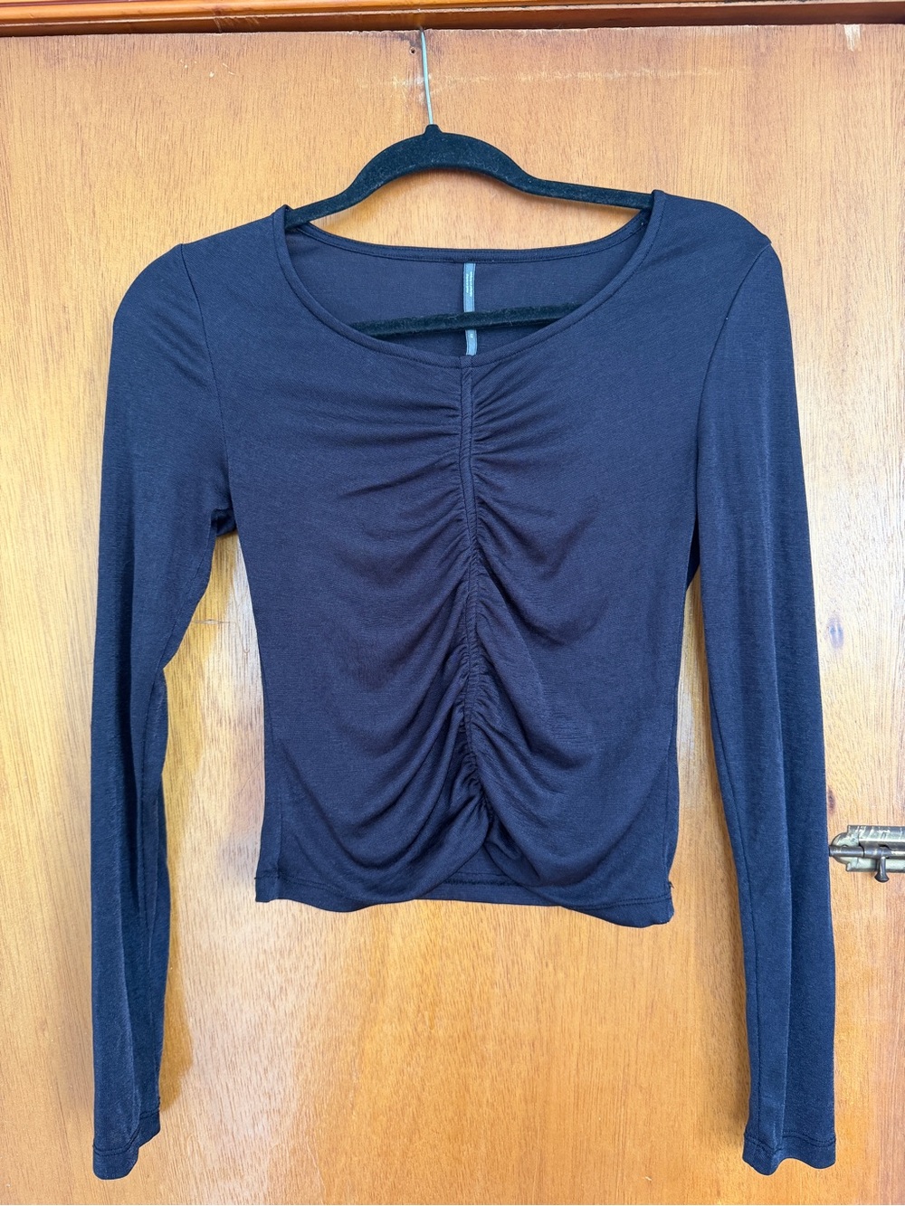 Anthropologie Black ruched long-sleeve top